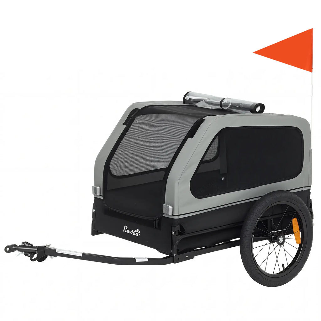 Remorque vélo pour chien, adaptée aux chiens de petite et moyenne taille jusqu'à 20 kg, avec attelage universel et hayon à rampe rabattable, couleur grise.